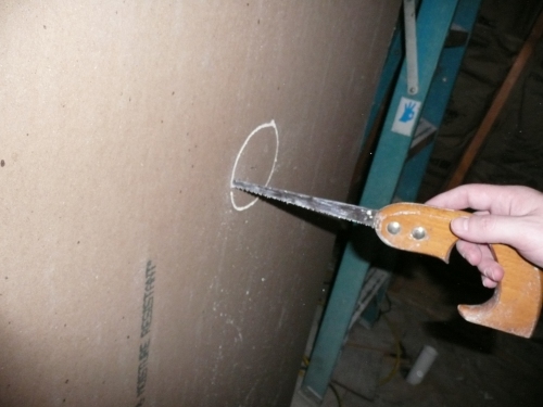 Cutting a hole for the shower fixtures